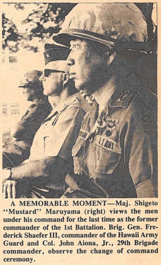 A MEMORABLE MOMENT-Maj. Shigeto "Mustard" Maruyama (right) views the men under his command for the last time as the former commander of the 1st Battalion. Brig. Gen. Frederick Shaefer III, commander of the Hawaii Army Guard and Col. John Aiona, Jr., 29th Brigade commander, observe the change of command ceremony.