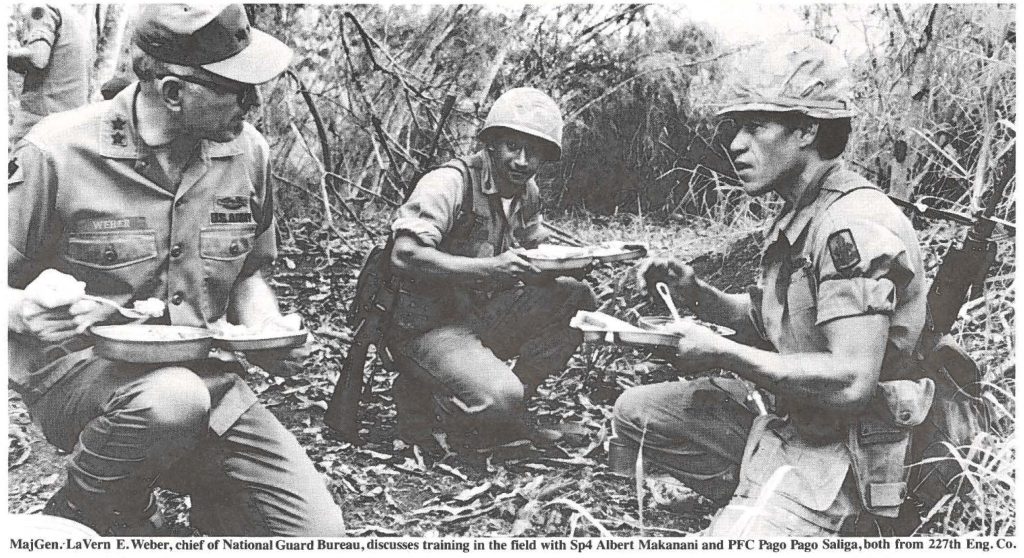 MajGen. LaVern E. Weber chief of National Guard Bureau, discusses training in the field with Sp4 Albert Makanani and PFC Pago Pago Saliga, both from 227th Eng. Co.