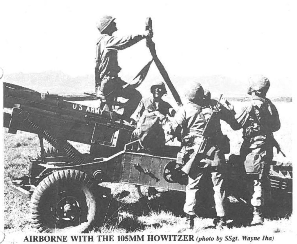 AIRBORNE WITH THE 105MM HOWITZER (Photo by SSgt. Wayne Iha)