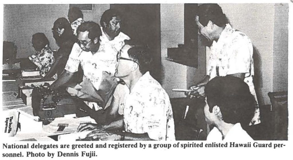 National delegates are greeted and registered by a group of spirited enlisted Hawaii Guard personnel. Photo by Dennis Fujii.