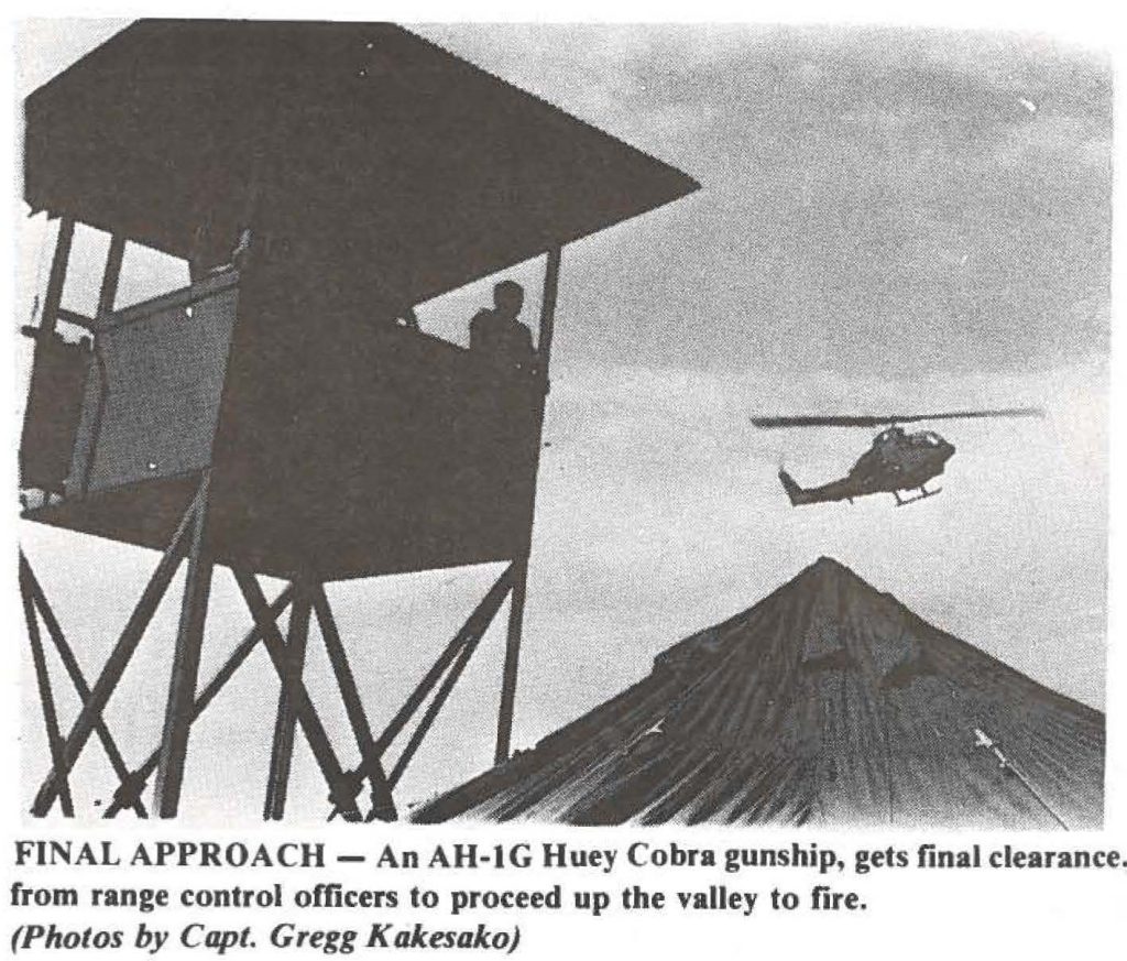 FINAL APPROACH - An AH-lG Huey Cobra gunship, gets final clearance. from range control officers to proceed up the valley to fire. (Photos by Capt. Gregg Kakesako)