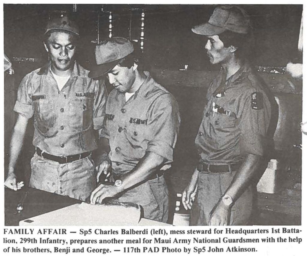 FAMILY AFFAIR - Sp5 Charles Balberdi (left), mess steward for Headquarters 1st Battalion, 299th Infantry, prepares another meal for Maui Army National Guardsmen with the help of his brothers, Benji and George. - 117th PAD Photo by Sp5 John Atkinson.