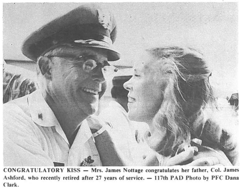 CONGRATULATORY KISS - Mrs. James Nottage congratulates her father, Col. James Ashford, who recently retired after 27 years of service. - I 17th PAD Photo by PFC Dana Clark