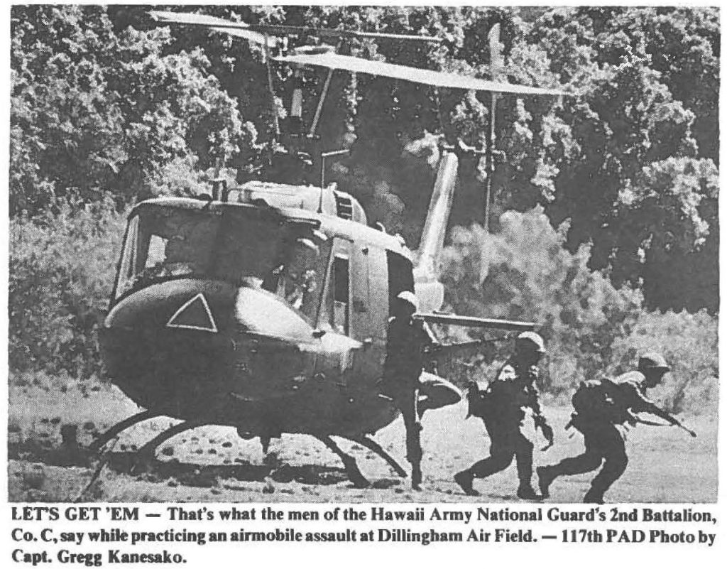 LETS GET 'EM - That's what the men of the Hawaii Army National Guard's 2nd Battalion, Co. C, say while practicing an airmobile assault at Dillingham Air Field. - 117th PAD Photo by Capt. Greig Kanesako.