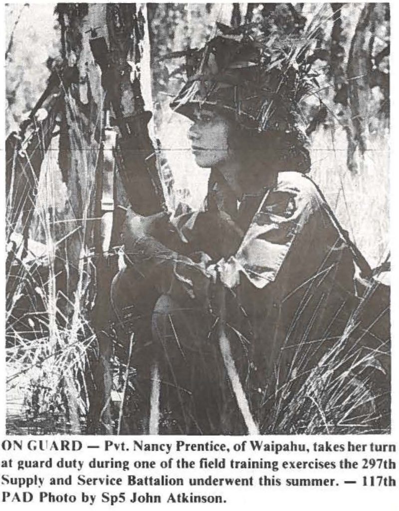 ON GUARD - Pvt. Nancy Prentice, of Waipahu. takes her turn at guard duty during one of the field training exercises the 297th Supply and Service Battalion underwent this summer. - 117th PAD Photo by Sp5 John Atkinson.