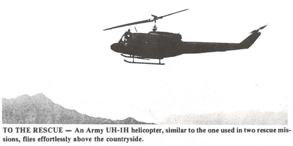 TO THE RESCUE - An Army UH-IH helicopter, similar to the one used in two rescue missions, flies effortlessly above the countryside.