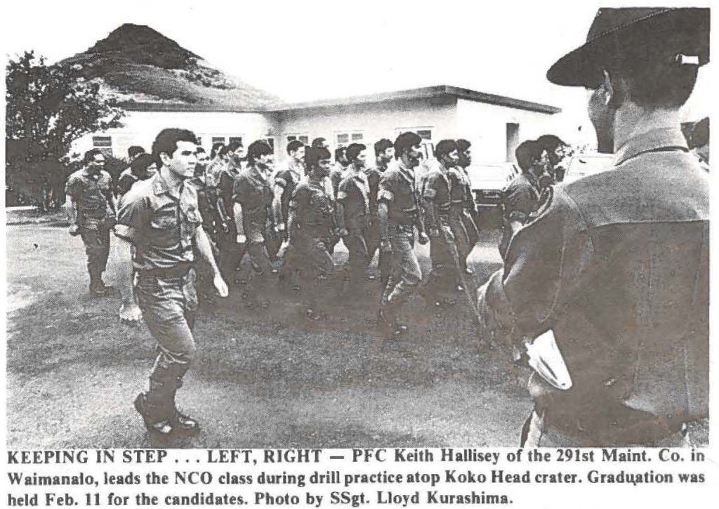 KEEPING IN STEP . . . LEFT, RIGHT - PFC Keith Hallisey of the 291st Maint. Co. in Waimanalo, leads the NCO class during drill practice atop Koko Head crater. Graduation was held Feb. 11 for the candidates. Photo by SSgt. Lloyd Kurashima.