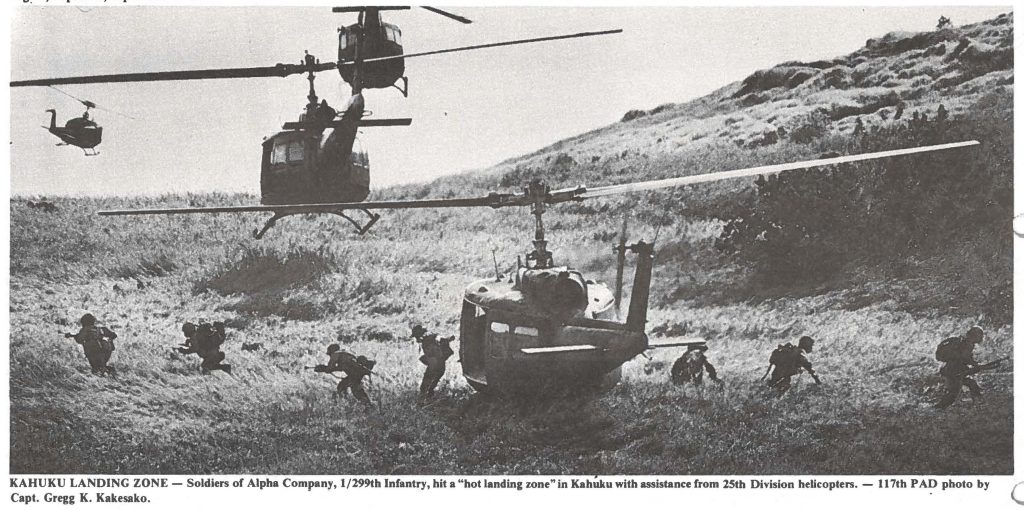 KAHUKU LANDING ZONE - Soldiers of Alpha Company, 1/299th Infantry, hit a "hot landing zone" in Kahuku with assistance from 25th Division helicopters. - 117th PAD photo by Capt. Gregg K. Kakesako.