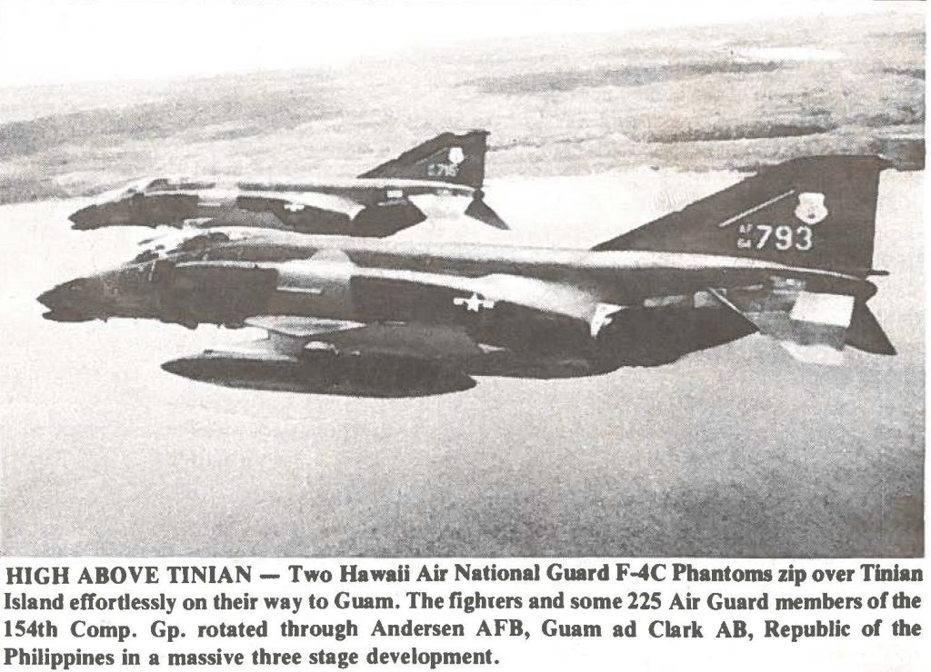 HIGH ABOVE TINIAN - Two Hawaii Air National Guard F-4C Phantoms zip over Tinian Island effortlessly on their way to Guam. The fighters and some 225 Air Guard members of the 154th Comp. Gp. rotated through Andersen AFB, Guam ad Clark AB, Republic of the Philippines in a massive three stage development.