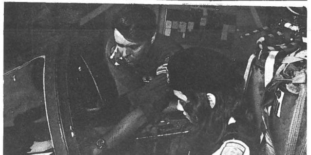 FUTURE F-4 FLYER! With all the talk about registration, a young woman from Punahou Jr. ROTC decides to cover her bets with a cockpit briefing from Capt. Pete Pawling, 199th TFS, during a recent field trip to Hickam Air Force Base.