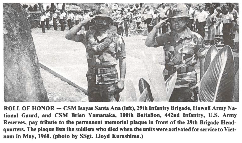 ROLL OF HONOR - CSM Isayas Santa Ana (left), 29th Infantry Brigade, Hawaii Army National Gaurd, and CSM Brian Yamanaka, 100th Battalion, 442nd Infantry, U.S. Army Reserves, pay tribute to the permanent memorial plaque in front of the 29th Brigade Headquarters. The plaque lists the soldiers who died when the units were activated for service to Vietnam in May, 1968. (photo by SSgt. Lloyd Kurashima.)