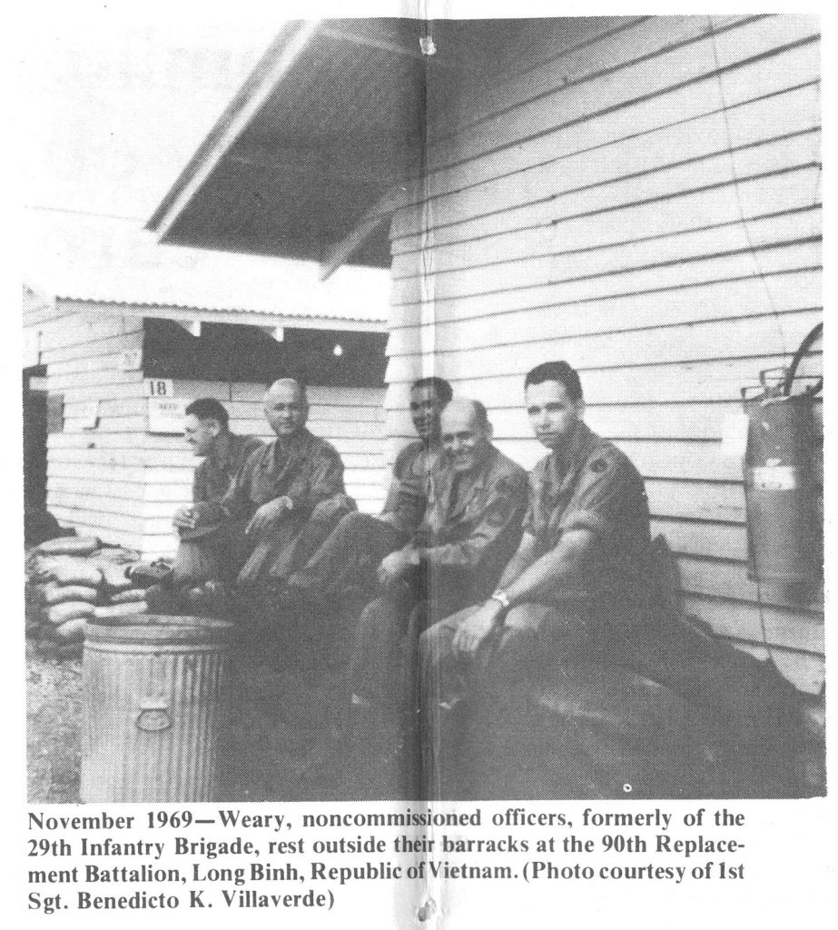 November 1969-Weary, noncommissioned officers, formerly of the 29th Infantry Brigade, rest outside their Barracks at the 90th Replacement Battalion, Long Binh, Republic of Vietnam (Photo courtesy of 1st Sgt. Benedicto K. Villaverde)