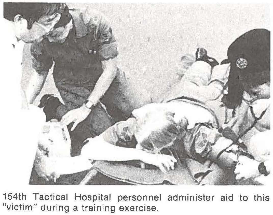 154th Tactical Hospital personnel administer aid to this "victim" during a training exercise.