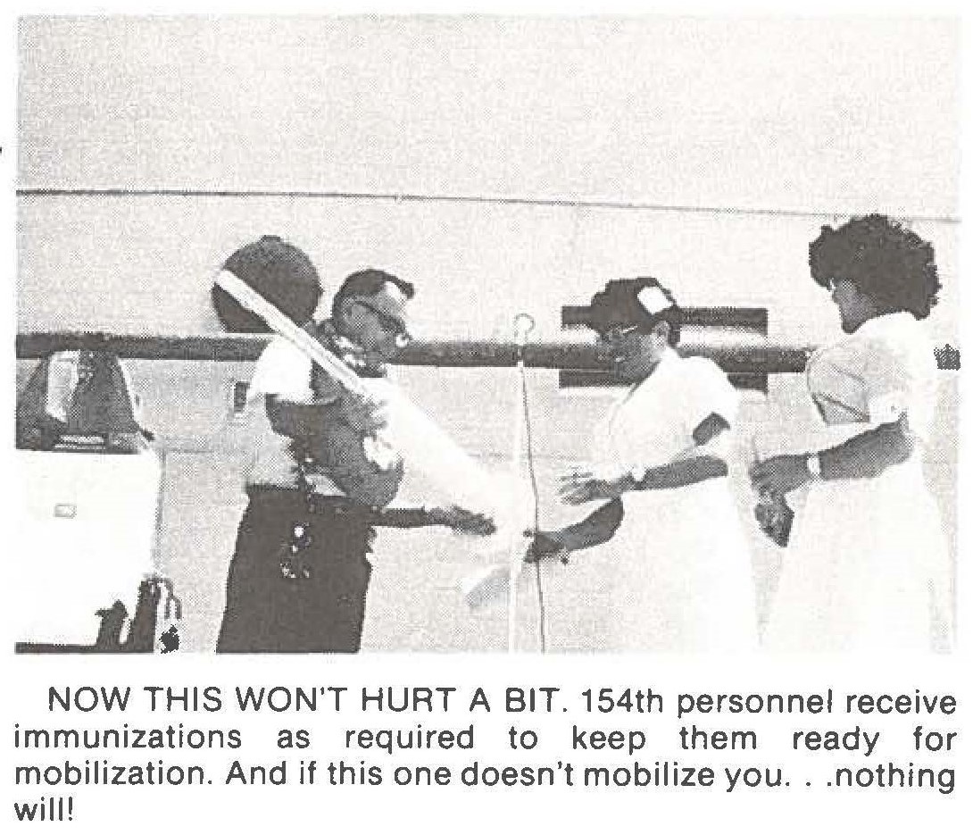 NOW THIS WON'T HURT A BIT. 154th personnel receive immunizations as required to keep them ready for mobilization. And if this one doesn't mobilize you ... nothing will!