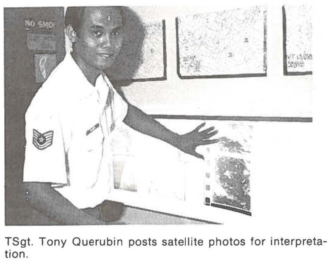 TSgt. Tony Querubin posts satellite photos for interpretation.