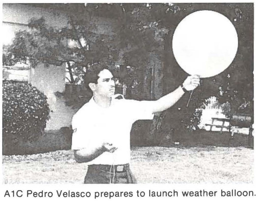 A1C Pedro Velasco prepares to launch weather balloon.