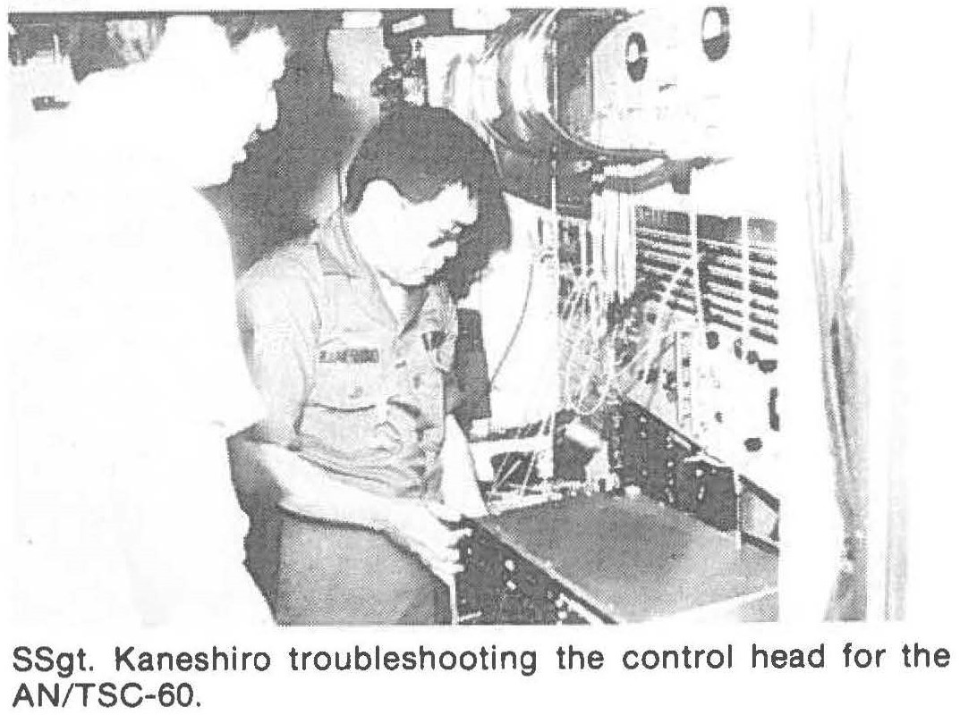 SSgt. Kaneshiro troubleshooting the control head for the AN/TSC-60.