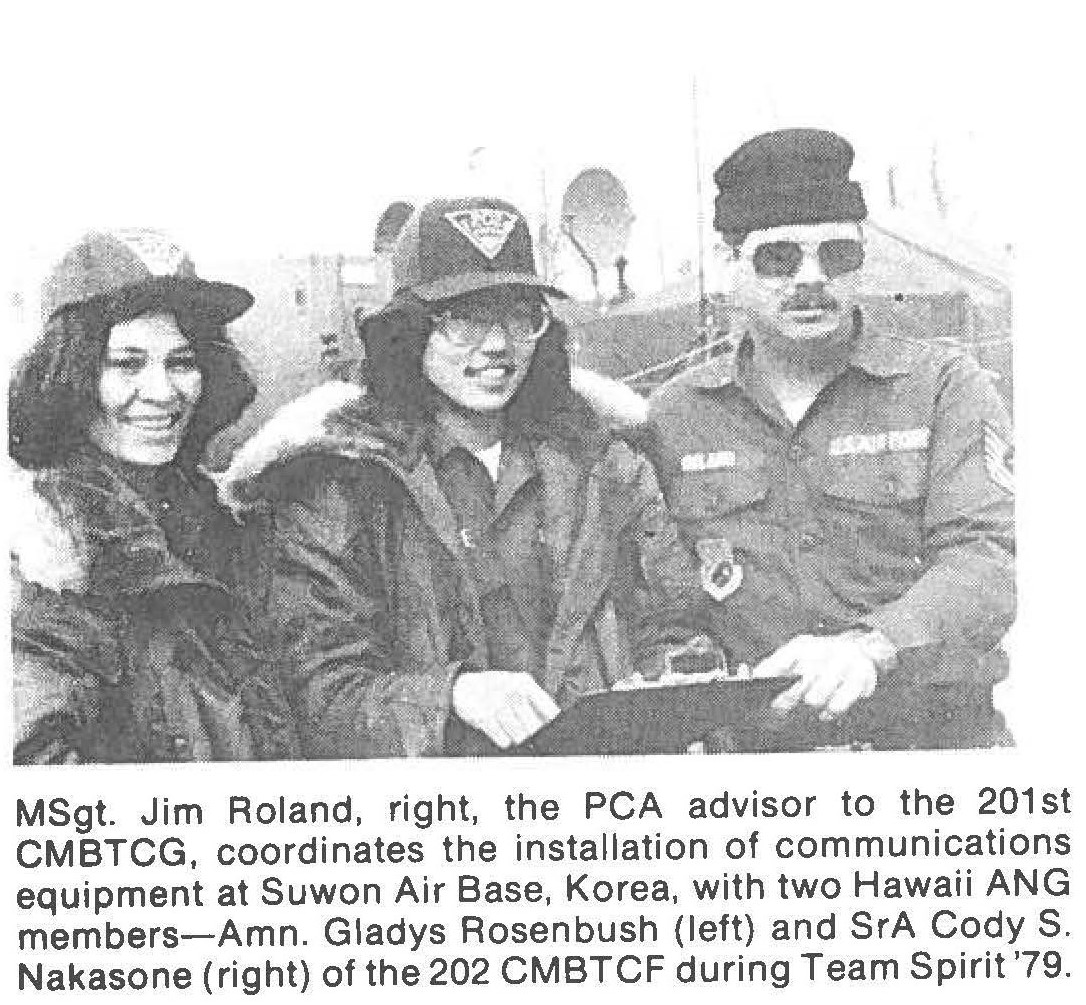 MSgt. Jim Roland, right, the PCA advisor to the 201st CMBTCG, coordinates the installation of communicatIons equipment at Suwon Air Base, Korea, with two Hawaii ANG members-Amn. Gladys Rosenbush (left) and SrA Cody S. Nakasone (right) of the 202 CMBTCF during Team Spirit '79.