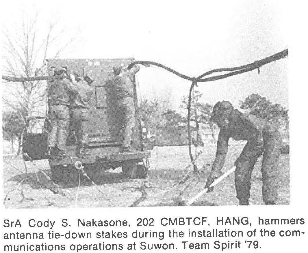 SrA Cody S. Nakasone, 202 CMBTCF, HANG, hammers antenna tie-down stakes during the installation of the communications operations at Suwon. Team Spirit '79.