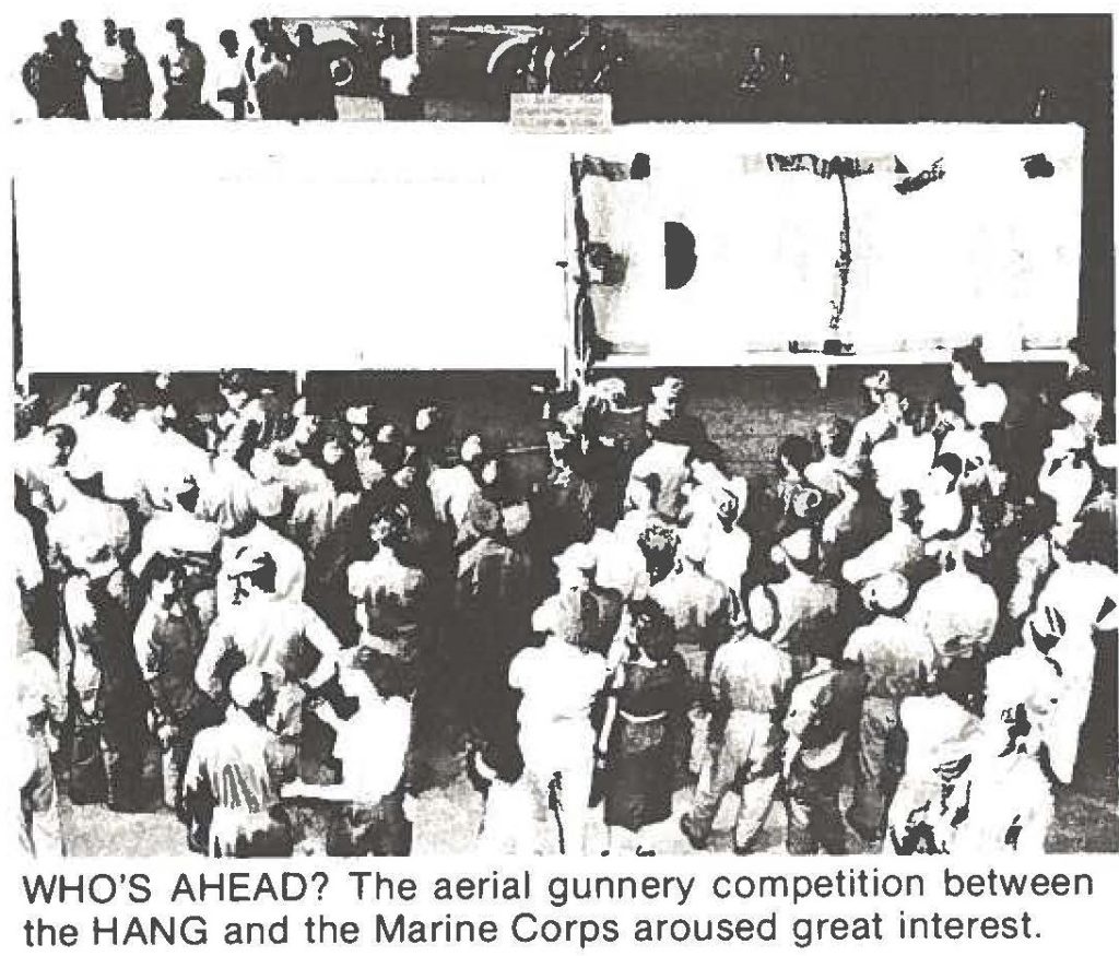 WHO'S AHEAD? The aerial gunnery competition between the HANG and the Marine Corps aroused great interest.