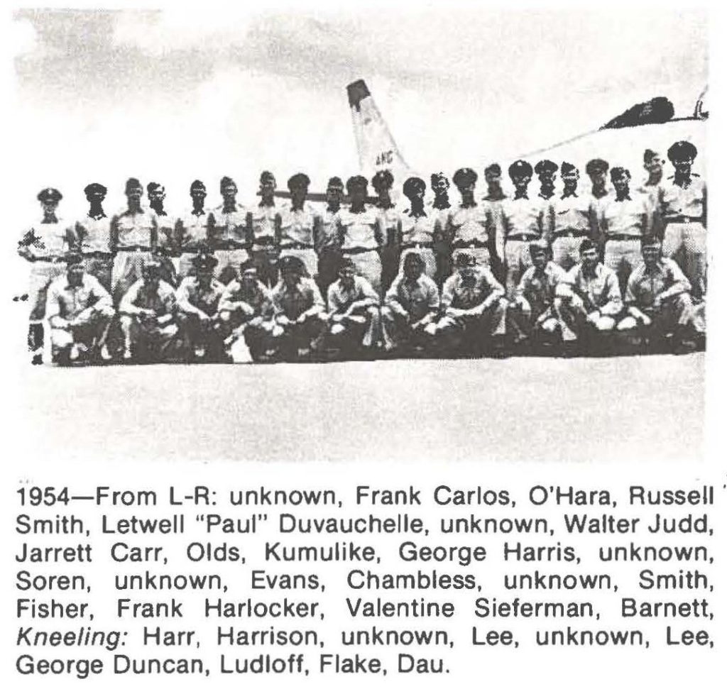 1954-From L-R: unknown, Frank Carlos, O'Hara, Russell Smith, Letwell "Paul" Duvauchelle, unknown, Walter Judd, Jarrett Carr, Olds, Kumulike, George Harris, unknown, Soren, unknown, Evans, Chambless, unknown, Smith, Fisher, Frank Harlocker, Valentine Sieferman, Barnett, Kneeling: Harr, Harrison, unknown, Lee, unknown, Lee, George Duncan, Ludloff, Flake, Dau.