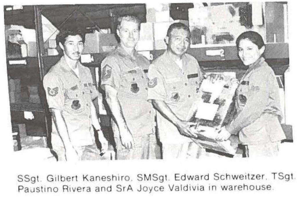 SSgl Gilbert Kaneshiro. SMSgL Edward Schweitzer. TSgt Paustino Rivera and SrA Joyce Valdivia in warehouse