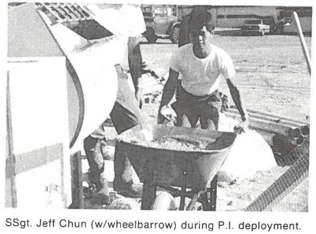 SSgt. Jeff Chun (w/wheelbarrow) during P.I. deployment.