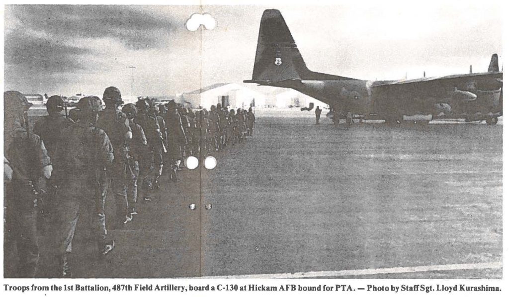 Troops from the 1st Battalion, 487th Field Artillery board a C-130 at Hickam AFB bound for PTA. - Photo by StaffSgt. Lloyd Kurashima.