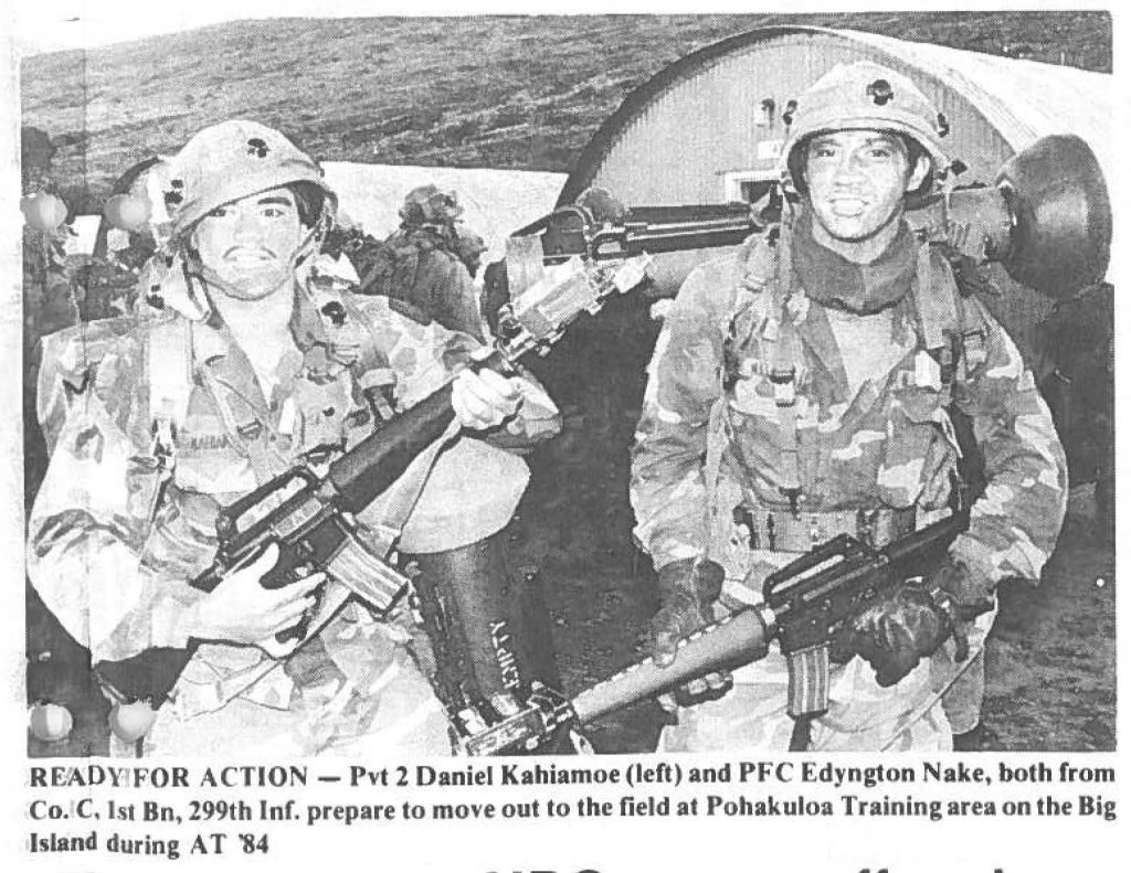 READY FOR ACTION - Pvt 2 Daniel Kahiamoe (left) and PFC Edyngton Nake, both from Co. C, 1st Bn, 299th Inf. prepare to move out to the field at Pohakuloa Training area on the Big Island during AT '84