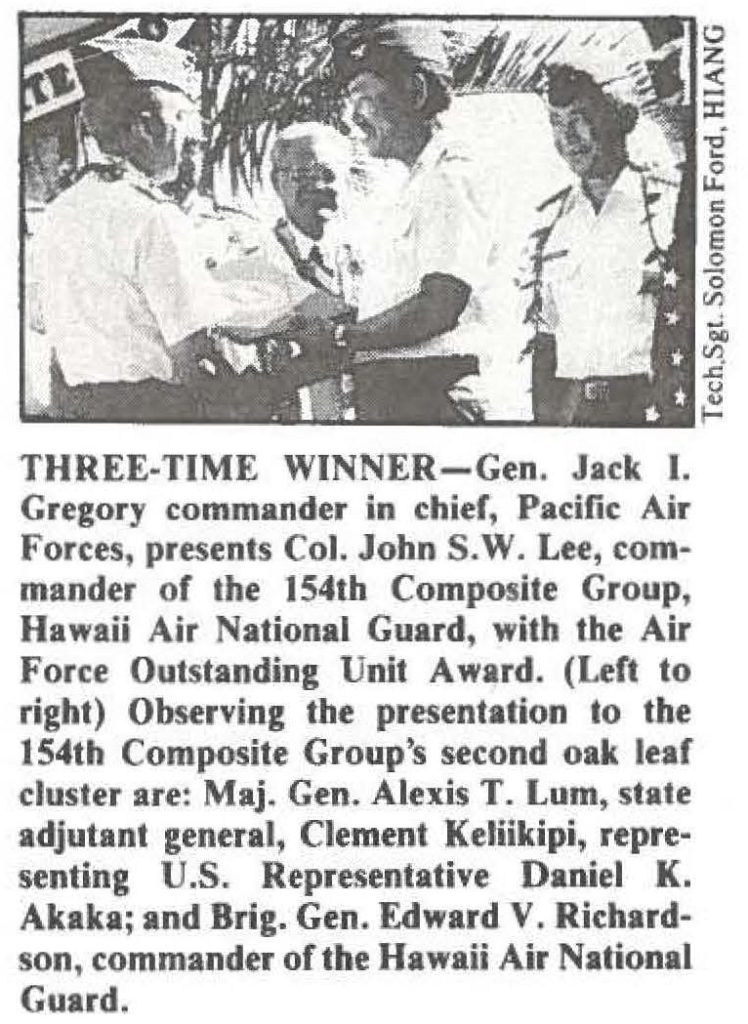 THREE-TIME WINNER-Gen. Jack I. Gregory commander in chief, Pacific Air Forces, presents Col. John S.W. Lee, commander of the 154th Composite Group, Hawaii Air National Guard, with the Air Force Outstanding Unit Award. (Left to right) Observing the presentation to the 154th Composite Group's second oak leaf cluster are: Maj. Gen. Alexis T. Lum, state adjutant general, Clement Keliikipi, representing U.S. Representative Daniel K. Akaka; and Brig. Gen. Edward V. Richardson, commander of the Hawaii Air National Guard.