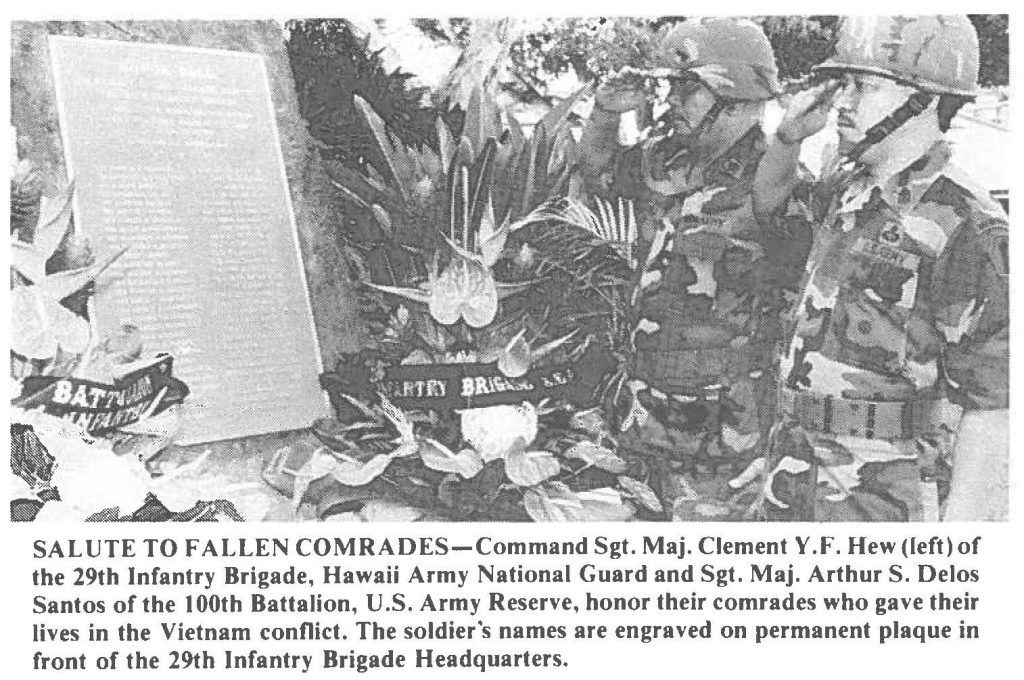 SALUTE TO FALLEN COMRADES-Command Sgt. Maj. Clement Y.F. Hew (left) of the 29th Infantry Brigade, Hawaii Army National Guard and Sgt. Maj. Arthur S. Delos Santos of the 100th Battalion, U.S. Army Reserve, honor their comrades who gave their lives in the Vietnam conflict. The soldier's names are engraved on permanent plaque in front of the 29th Infantry Brigade Headquarters.