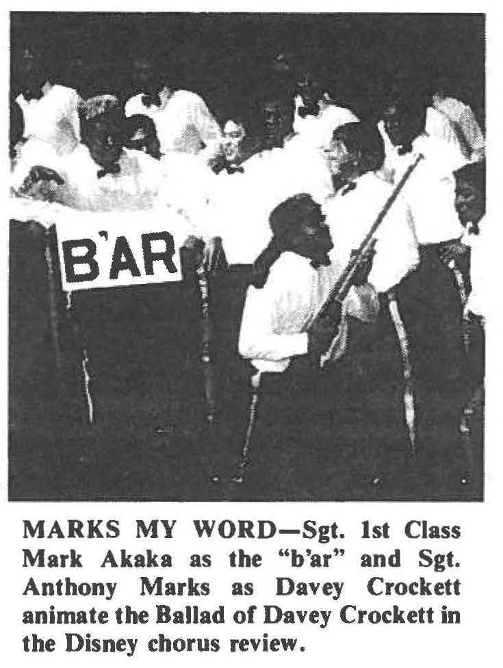 MARKS MY WORD-Sgt. 1st Class Mark Akaka as the "b'ar" and Sgt. Anthony Marks as Davey Crockett animate the Ballad of Davey Crockett in the Disney chorus review.