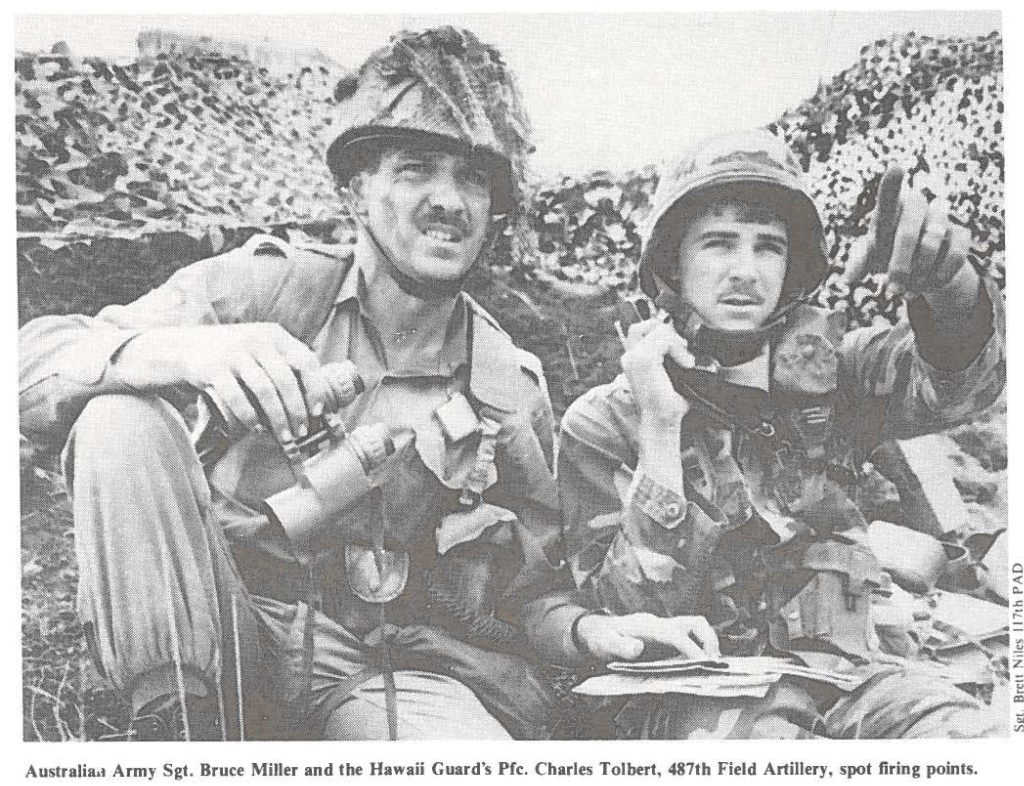 Australia, Army Sgt. Bruce Miller and the Hawaii Guard's Pfc. Charles Tolbert, 487th Field Artillery, spot firing points.