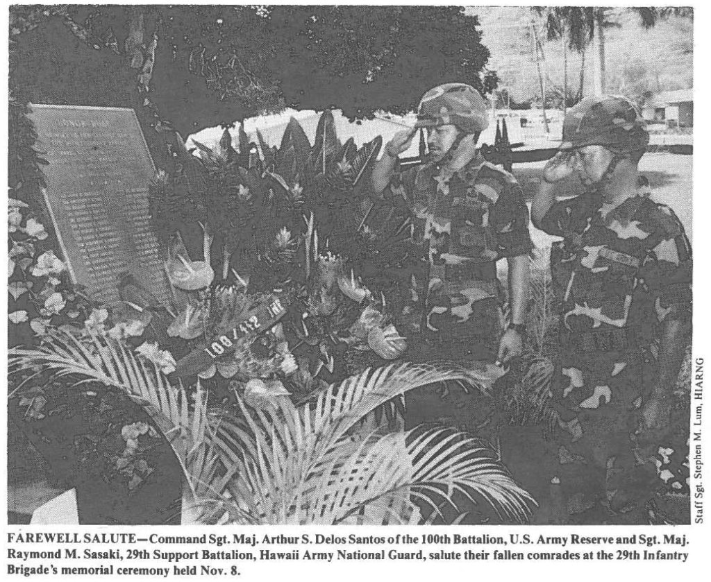 FAREWELL SALUTE-Command Sgt. Maj. Art.bur S. Delos Santos or the 100th Battalion, U.S. Army Reserve and Sgt. Maj. Raymond M. Sasaki, 29th Support Battalion, Hawaii Army National Guard, salute their fallen comrades at the 29th Infantry Brigade's memorial ceremony held Nov. 8.