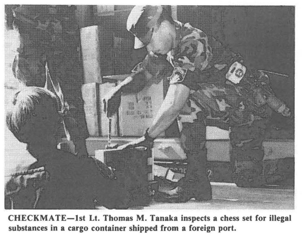 CHECKMATE-1st Lt. Thomas M. Tanaka inspects a chess set for illegal substances in a cargo container shipped from a foreign port.