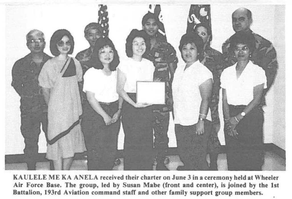 KAULELE ME KA ANELA received their charter on June 3 in a ceremony held al Wheeler Air Force Base. The group, led by Susan Mabe (front and center), is joined by the 1st Battalion, 193rd Aviation command staff and other family support group members.
