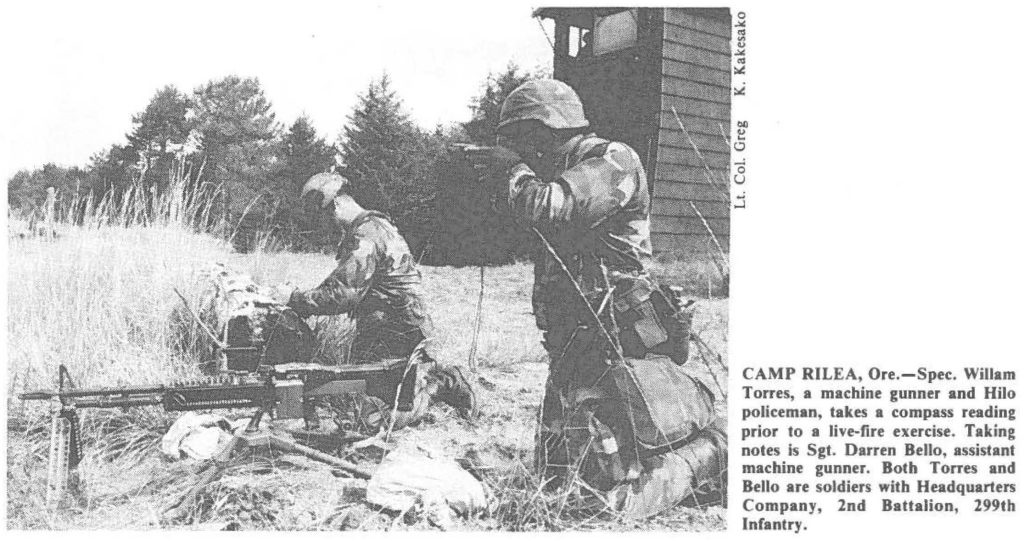 CAMP RILEA, Ore.-Spec. Willam Torres, a machine gunner and Hilo policeman, takes a compass reading prior to a live-fire exercise. Taking notes is Sgt. Darren Bello, assistant machine gunner. Both Torres and Bello are soldiers with Headquarters Company, 2nd Battalion, 299th Infantry.