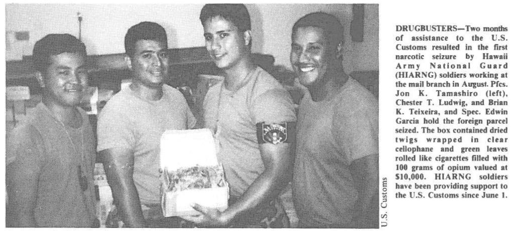 DRUGBUSTERS- Two months of assistance to the U.S. Customs resulted In the first narcotic seizure by Hawaii Army National Guard (HIARNG) soldiers working at the mall branch in August. Pres. Jon K. Tamashiro (left), Chester T. Ludwig, and Brian K. Teixeira, and Spec. Edwin Garcia hold the foreign parcel seized. The box contained dried twigs wrapped in clear cellophane and green leaves rolled like cigarettes filled with 100 grams of opium valued at $10,000. HIARNG soldiers have been providing support to the U.S. Customs since June 1.