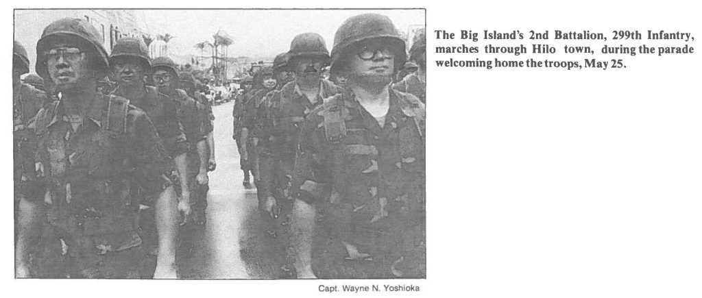 The Big Island's 2nd Battalion, 299th Infantry, marches through Hilo town, during the parade welcoming home the troops, May 25.