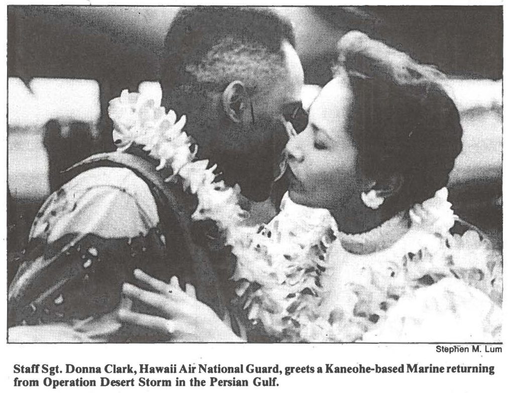 Staff Sgt. Donna Clark, Hawaii Air National Guard, greets a Kaneohe-based Marine returning from Operation Desert Storm in the Persian Gulf.