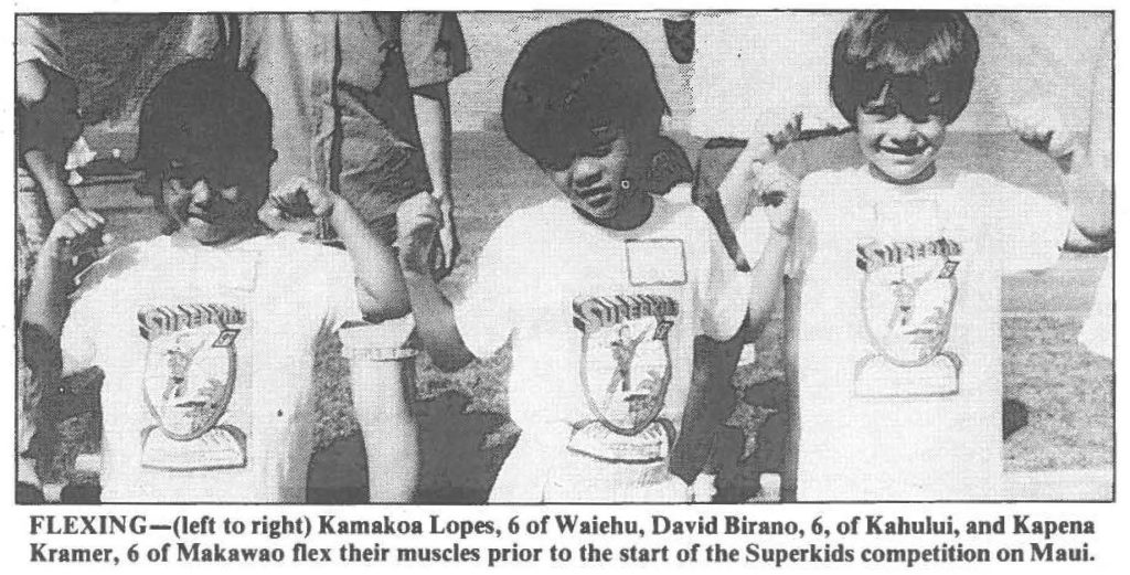 FLEXING-(left to right) Kamakoa Lopes, 6 of Waiehu, David Birano, 6, of Kahului, and Kapena Kramer, 6 of Makawao flex their muscles prior to the start of the Superkids competition on Maui.