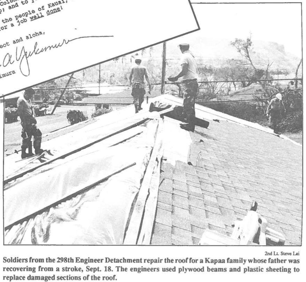 Soldiers from the 298th Engineer Detachment repair the roof for a Kapaa family whose father was recovering from a stroke, Sept. 18. The engineers used plywood beams and plastic sheeting to replace damaged sections or the roof.