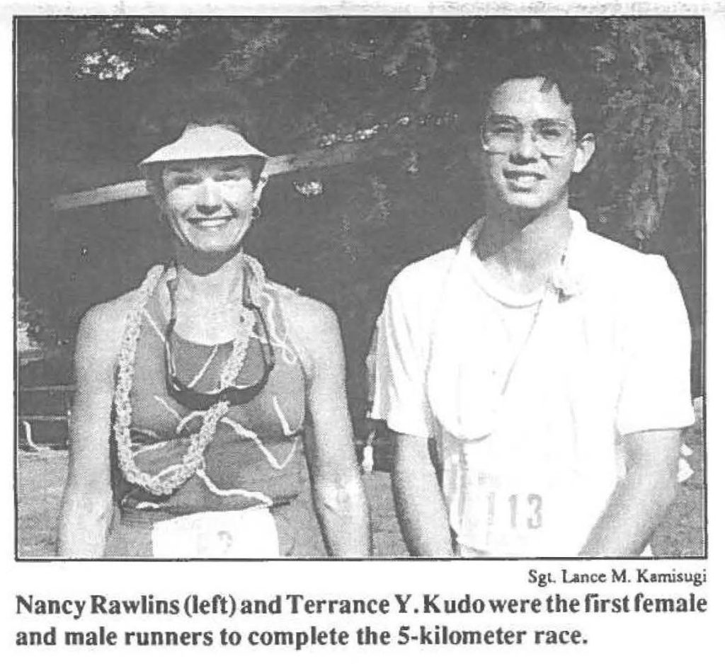 Nancy Rawlins (left) and Terrance Y. Kudo were the first female and male runners to complete the 5-kilometer race.