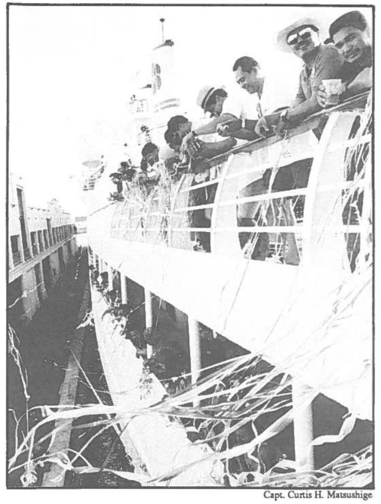 Members of the Hawaii National Guard unfurl streamers from the decks of the SS Constitution as they set sail from Aloha Tower on a three-day cruise to Kauai, Jan. 2.