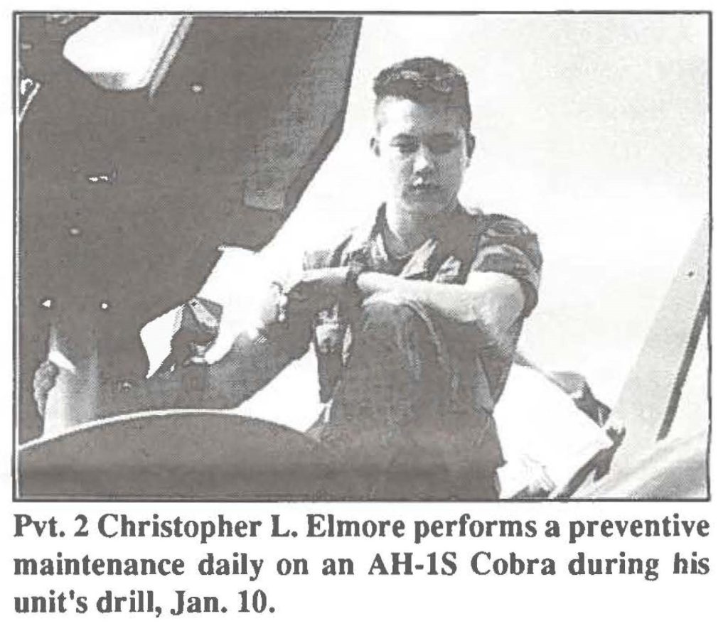 Pvt. 2 Christopher L. Elmore performs a preventive maintenance daily on an AH-lS Cobra during his unit's drill, Jan. 10.