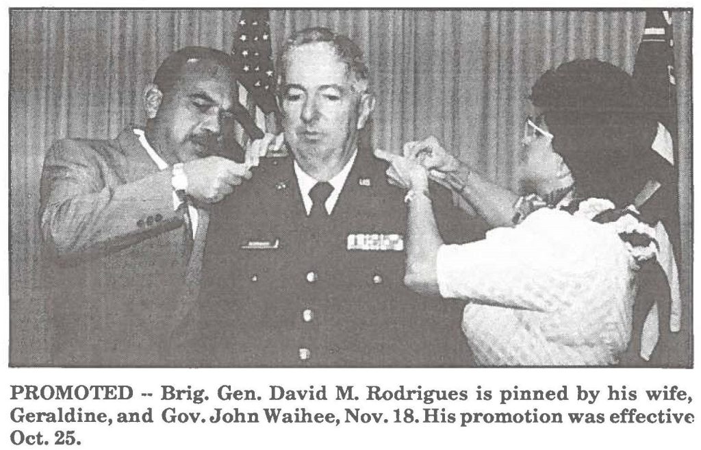 PROMOTED -- Brig. Gen. David M. Rodrigues is pinned by his wife, Geraldine, and Gov. John Waihee, Nov.18. His promotion was effective Oct. 25