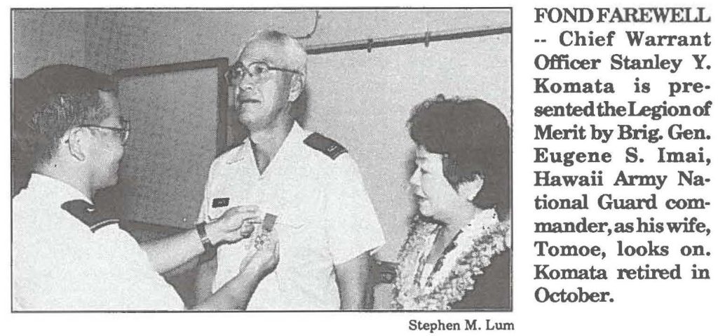 FOND FAREWELL -- Chief Warrant Officer Stanley Y. Komata is presented the Legion of Merit by Brig. Gen. Eugene S. Imai, Hawaii Army National Guard commander, as his wife, Tomoe, looks on. Komata retired in October.