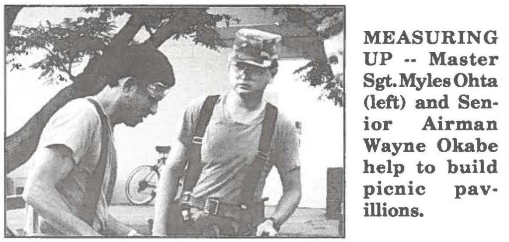 MEASURING UP -- Master Sgt. Myles Ohta (left) and Senior Airman Wayne Okabe help to build picnic pavilions.