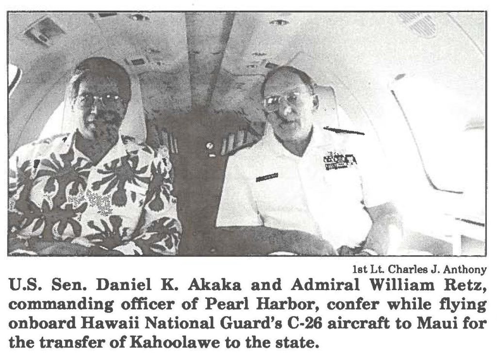U.S. Sen. Daniel K. Akaka and Admiral William Retz, commanding officer of Pearl Harbor, confer while flying onboard Hawaii National Guard's C-26 aircraft to Maui for the transfer of Kahoolawe to the state.