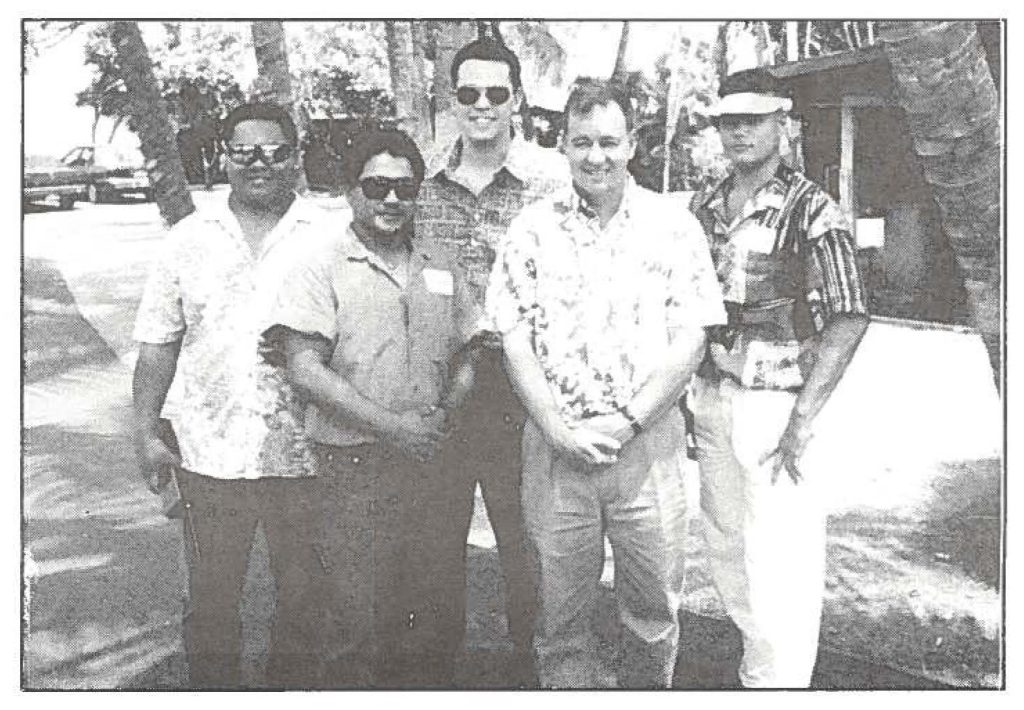 HAWAIIAN HOSPITALITY (Right)-- Sgt. Freddy Daquez, Maj. Michael Tarpley, Sgt. Daniel Lau, Spc. Michael Ecsedy and Sgt. Christopher Ribucan take a break from busy day of providing logistical assistance for the Kahoolawe transfer ceremony. All the soldiers, exceptRibucan (Company C) are from Headquarters and Headquarters Company, 1st Battalion, 299th Infantry, Maui.